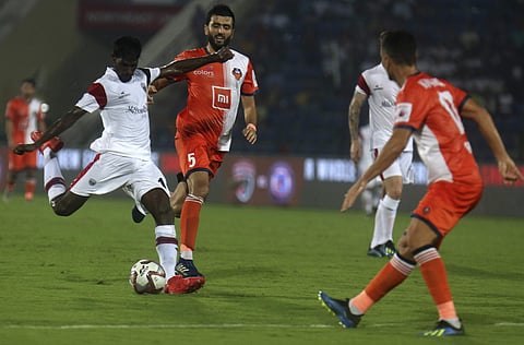 Rowllin Borges of North East United FC attempts an unsuccessful goal against FC Goa during the Hero Indian Super League soccer match in Gauhati, India. (Photo | AP)