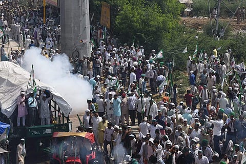 Protesting farmers clash with security forces at the Ghazipur Delhi border on Tuesday. | (Parveen Negi | EPS)