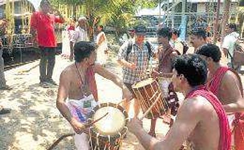 Tourists enjoying Chendamelam.