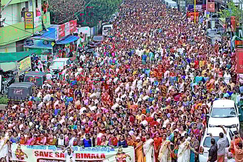 Hundreds of women staging the protest march on Tuesday at Pandalam holy town against the Supreme Court verdict which allowed the women of menstruating age to enter the Sabarimala hill shrine. Photo | EPS/Shaji Vettipuram)