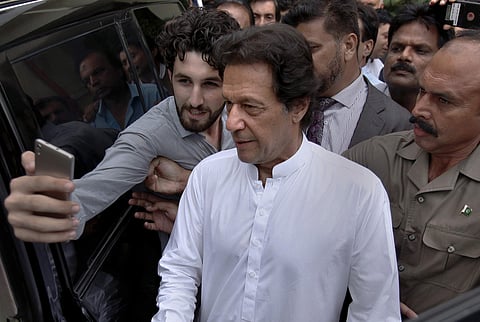 A Pakistani takes selfie with Imran Khan. (Photo| AP)