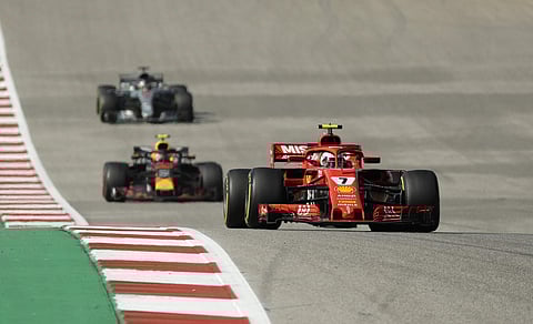 Ferrari driver Kimi Raikkonen, of Finland, leads Red Bull driver Max Verstappen, of the Netherlands, and Mercedes driver Lewis Hamilton, of Britain, into turn one during the Formula One U.S. Grand Prix auto race at the Circuit of the Americas. (Photo | AP