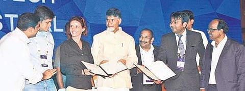 CM N Chandrababu Naidu exchanging MoU with representatives of companies at the Fintech Festival at Hotel Novotel in Vizag on Tuesday G satyanarayana