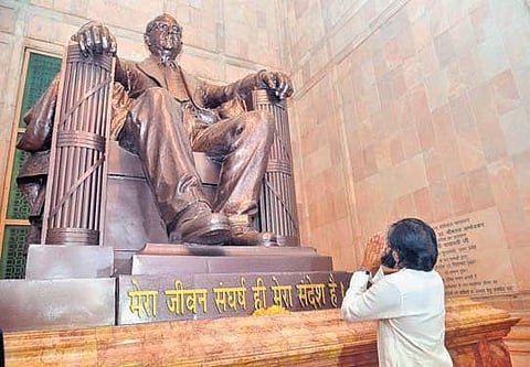 Jana Sena chief Pawan Kalyan paying respects to the statue of Dr BR Ambedkar in Lucknow on Wednesday | Express
