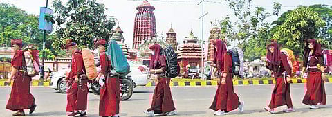 Buddhist devotees on their way to visit the Peace Pagoda at Dhauli on the outskirts of Bhubaneswar on Wednesday | Express