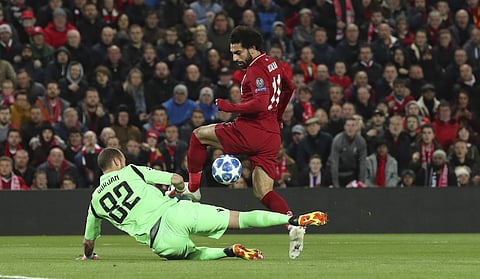 Liverpool forward Mohamed Salah, tries to get past Red Star goalkeeper Milan Borjan | AP