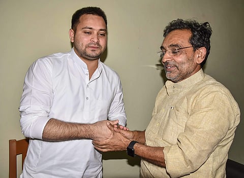RLSP chief Upendra Kushwaha (right) and RJD leader Tejashwi Yadav, on left, meeting each other on 26 October, 2018. (Photo | PTI)