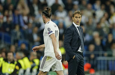 Real's Gareth Bale, left, leaves the field as Real Madrid coach Julen Lopetegui looks | AP
