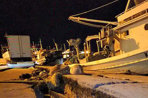 Damages are seen at the port of the western island of Zakynthos, Greece, Friday, Oct. 26, 2018. A strong pre-dawn earthquake with magnitude 6.8 has struck off the western Greek tourist island of Zakynthos in the Ionian Sea, and was felt as far away as Ath
