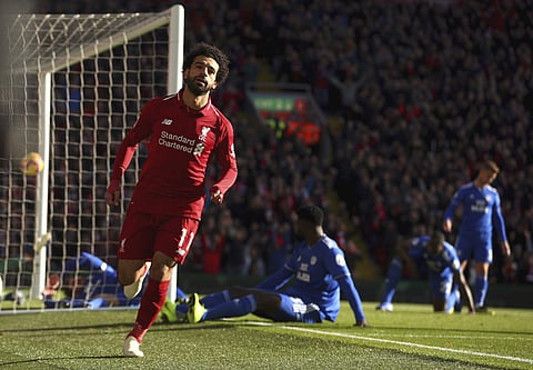 Liverpool's Mohamed Salah celebrates scoring his side's first goal of the game, during the English Premier League soccer match between Liverpool and Cardiff City at Anfield, in Liverpool, Oct. 27, 2018. (Photo | AP)
