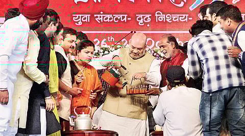 Another ‘humble chaiwala’: Amit Shah pours out tea for party leaders on the stage of the BJYM’s national convention, held in Hyderabad on Sunday | S Senbagapandiyan