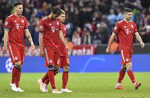 Bayern players walk off the pitch after a 1-1 draw in the Group E Champions League soccer match between Bayern Munich and Ajax at the Allianz Arena in Munich. (Photo | AP)