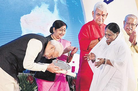 The spiritual leader was honoured for donating I100 cr towards the Clean India campaign, the largest donation since its inception in 2014 | Express