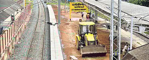 Platform laying works as part of track realignment at St Thomas Mount station being carried out on Tuesday | D SAMPATHKUMAR