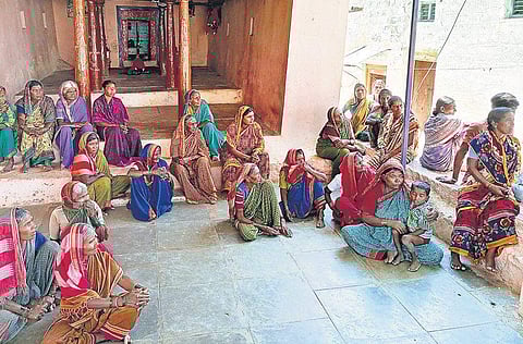 Women gathered at a temple to discuss their fight against liquor