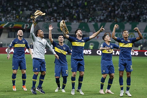 Players of Argentina's Boca Juniors celebrate their 2-2 draw against Brazil's Palmeiras after a Copa Libertadores second leg semifinal | AP