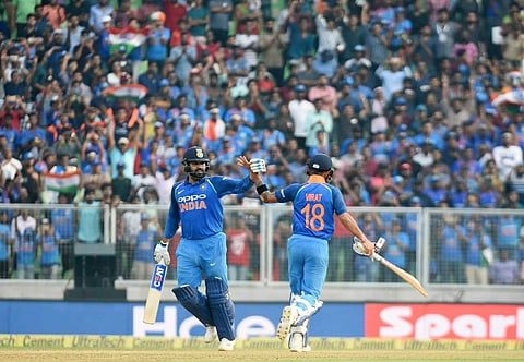 India's Rohit Sharma, left, and captain Virat Kohli celebrate their win over West Indies' in the fifth and last one-day international cricket matcT in Thiruvananthapuram. (Photo | B P Deepu/EPS)