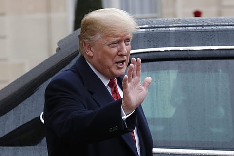 U.S President Donald Trump gestures outside the Elysee Palace after his talks with French President Emmanuel Macron in Paris, Saturday, Nov.10, 2018. (Photo | AP)