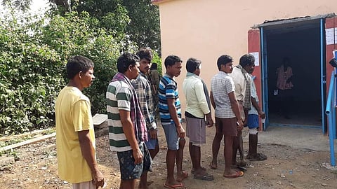 Tribal voters in queue at Sukma. (Photo|ANI)