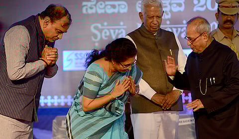 Then President Pranab Mukherjee greets Union Minister H N Ananth Kumar, his wife and Adamaya Chetana managing trustee Tejaswini Ananth Kumar (File | EPS)
