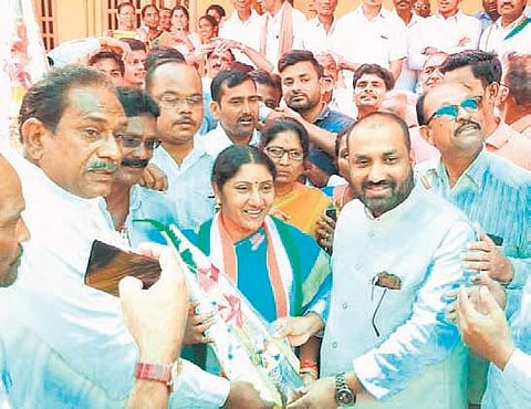 Congress minority cell district president Sajeed Khan meets the party candidate of Adilabad constituency, G Sujatha, at her residence on Wednesday | Express