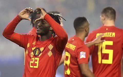 Belgium's Michy Batshuayi (L) jubilates after scoring his sides first goal during the UEFA Nations League match against Iceland | AP
