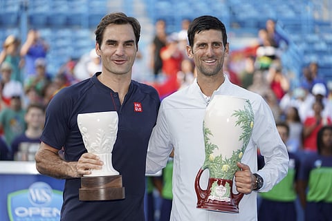 Novak Djokovic (R) of Serbia, with Roger Federer of Switzerland (File photo | AP)