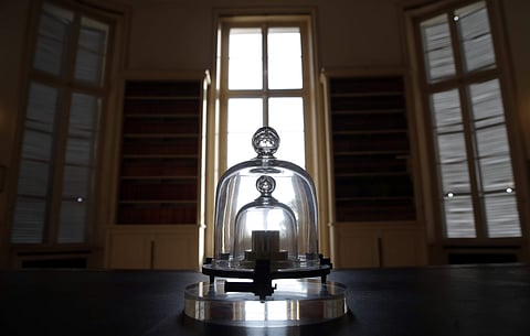 A replica of the International Prototype Kilogram is pictured at the International Bureau of Weights and Measures, in Sevres, near Paris. (Photo: AP)
