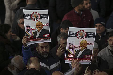 The members of Arab-Turkish Media Association and friends hold posters as they attend funeral prayers in absentia for Saudi writer Jamal Khashoggi who was killed last month in the Saudi Arabia consulate, in Istanbul, Friday, Nov. 16, 2018. (Photo | AP)