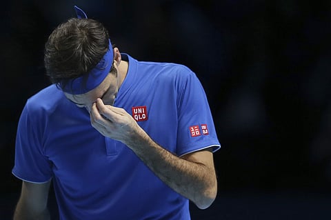 Roger Federer of Switzerland looks dejected after losing a point to Alexander Zverev of Germany in their ATP World Tour Finals singles tennis match | AP
