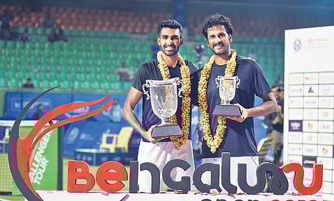 Prajnesh Gunneswaran (L) after winning the Bengaluru Open | Vinod Kumar T
