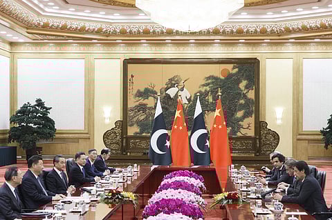 Pakistan's Prime Minister Imran Khan, right, attends talks with Chinese President Xi Jinping at the Great Hall of the People in Beijing | AP