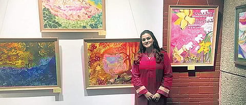 Artist Parul Mehra along with her art works