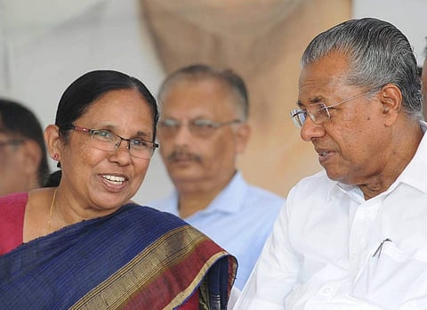 Kerala Minister for Health, Social Justice and Woman and Child Development KK Shailaja with CM Pinarayi Vijayan (Facebook photo)