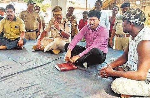 RDC D V Swamy interacting with villagers at Balarampur in Dhenkanal on Tuesday | Express