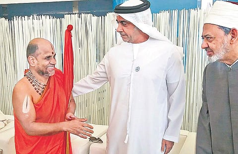 Deputy Prime Minister of UAE, Saif Bin Zyed Al Nahyan commends Sri Sri Sugunendra Theertha Swamiji after his address at the Interfaith Alliance Summit in Abu Dhabi on Tuesday | Express