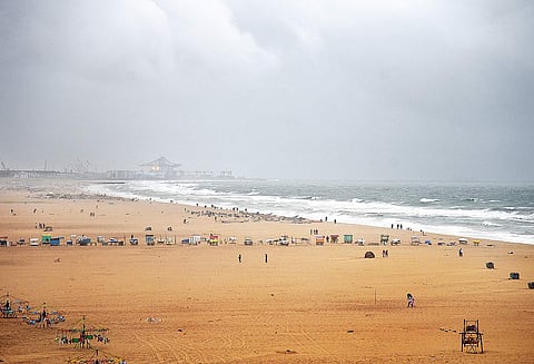 Dark clouds loom over Marina as the city witnessed drizzles and slight showers at regular intervals on Wednesday | MARTIN LOUIS
