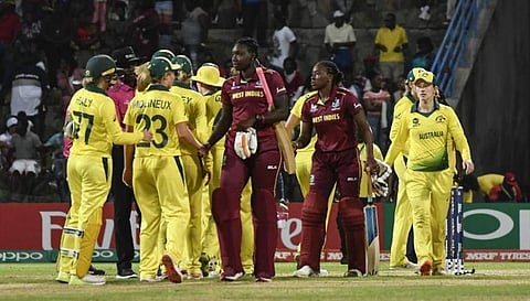 Shamilia Connell (L) and Shakera Selman (R) of West Indies congratulate Australia for winning the ICC Women's World T20 1st semi-final match between Australia and West Indies at Sir Vivian Richards Cricket Ground, North Sound, Antigua and Barbuda. (Photo
