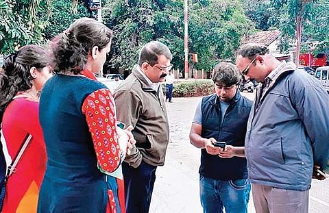 Members of an NGO demonstrate the tree mapping software before BBMP forest officials at an event in Bengaluru on Thursday