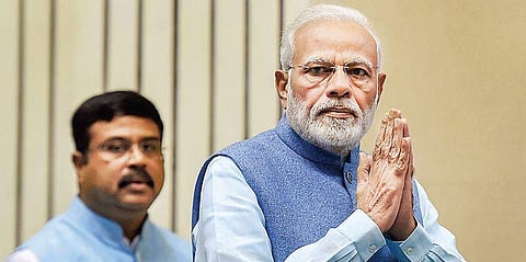 Prime Minister Narendra Modi and Union IT Minister Harsh Vardhan arrive to lay foundation stone for City Gas Distribution projects in New Delhi on Thursday (Photo | PTI)