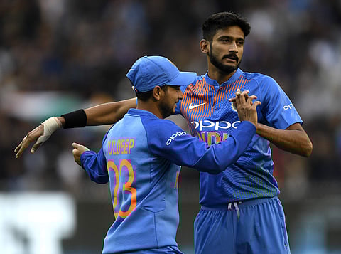 Young India pacer Khaleel Ahmed celebrates a wicket with teammate Kuldeep Yadav | AP
