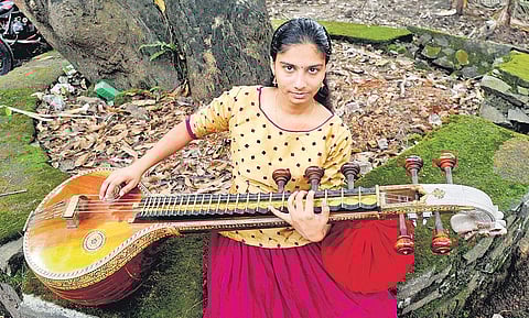 Avani Ajay of Nirmala HSS, Aluva, who won first prize for veena recital | A Sanesh