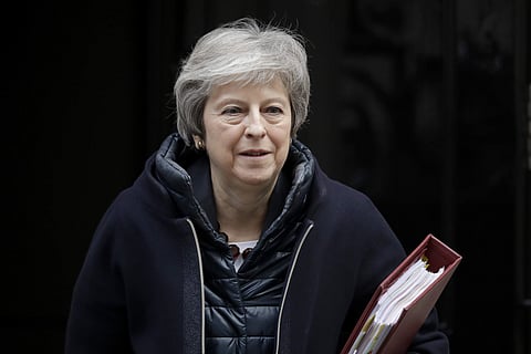 British Prime Minister Theresa May leaves 10 Downing Street in London, to attend Prime Minister's Questions at the Houses of Parliament. (Photo| AP)