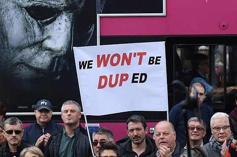 Protesters participate in an anti-Brexit demonstration at City Hall in central Belfast, Northern Ireland October 20, 2018. (Photo: Reuters)