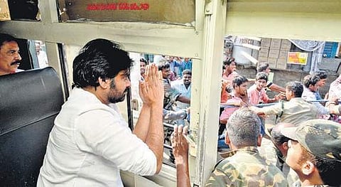 Jana Sena chief Pawan Kalyan during his bus journey from Rajamahendravaram to Rampachodavaram on Saturday | Express