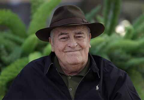 Italian film director Bernardo Bertolucci poses for photographers during a photo call in Rome. (Photo | AP)