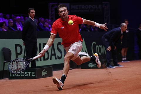 Croatia's Borna Coric returns the ball to France's Jeremy Chardy during the Davis Cup final between France and Croatia. ( Photo | AP)