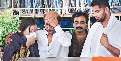 Actor Rajinikanth consoles Ambareesh’s wife Sumalatha and son Abhishek (extreme right) on Sunday. Producer Rockline Venkatesh is also seen | Shriram B N