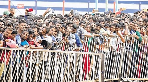 Fans gather outside Kanteerava Stadium to get a final glimse of Ambareesh on Sunday | pandarinath b