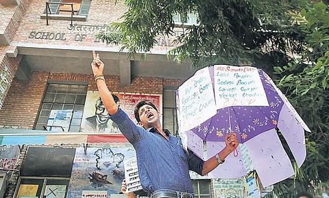 File photo of a student campaigning during the JNUSU polls | EXPRESS FILE PHOTO